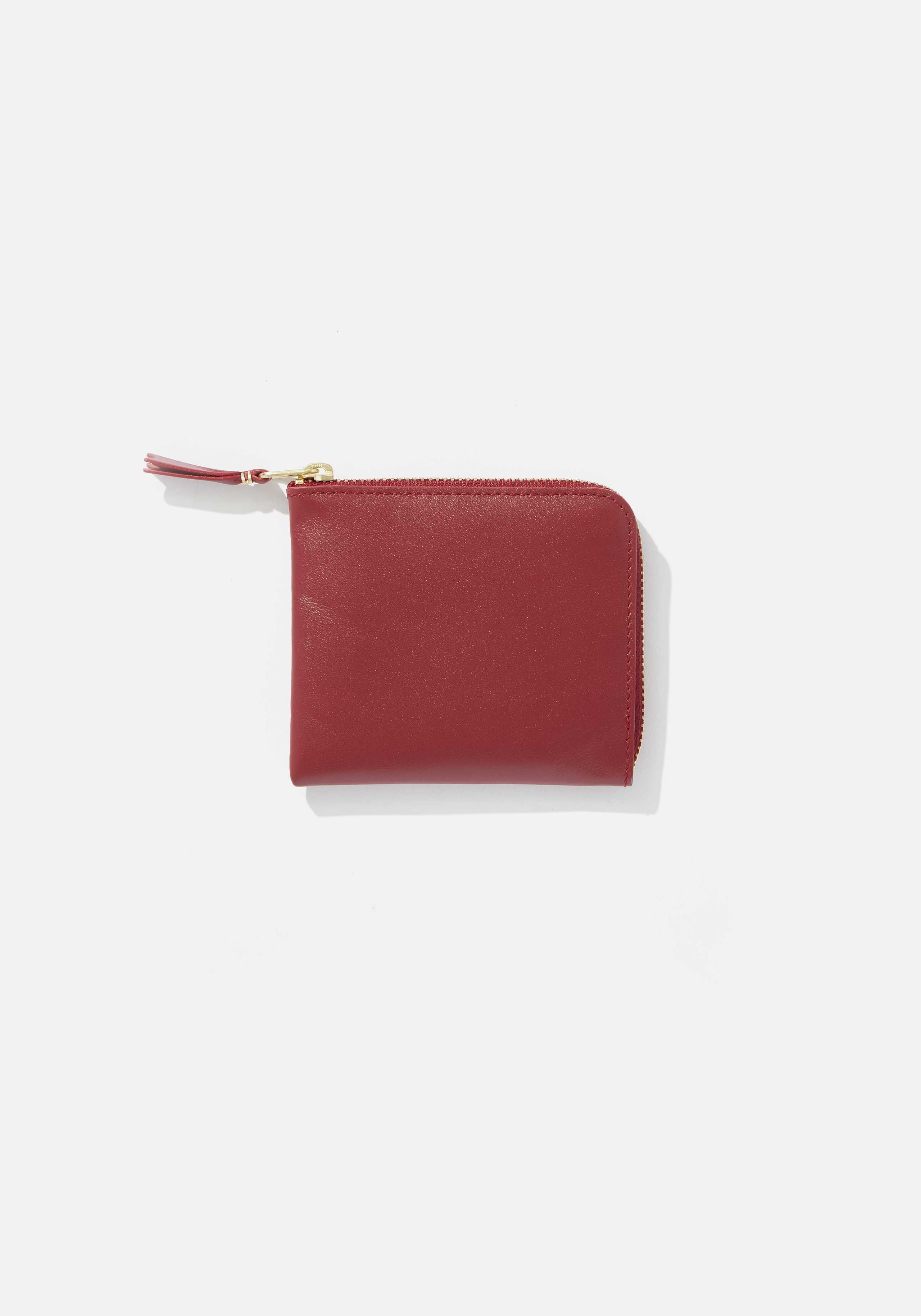 COMME DES GARCONS HALF ZIP WALLET