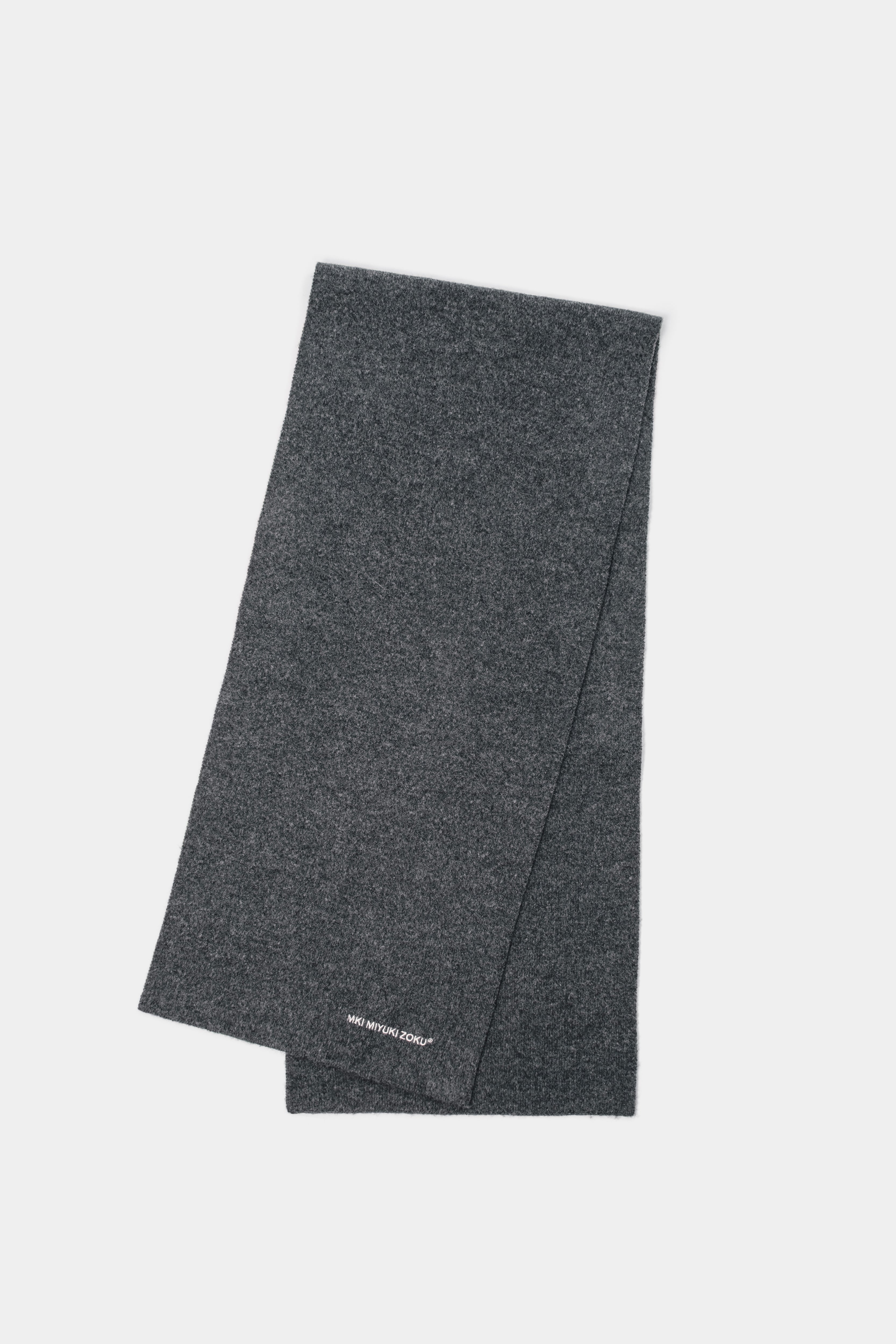 Full-length flat lay of the Charcoal double knit scarf folded lengthways