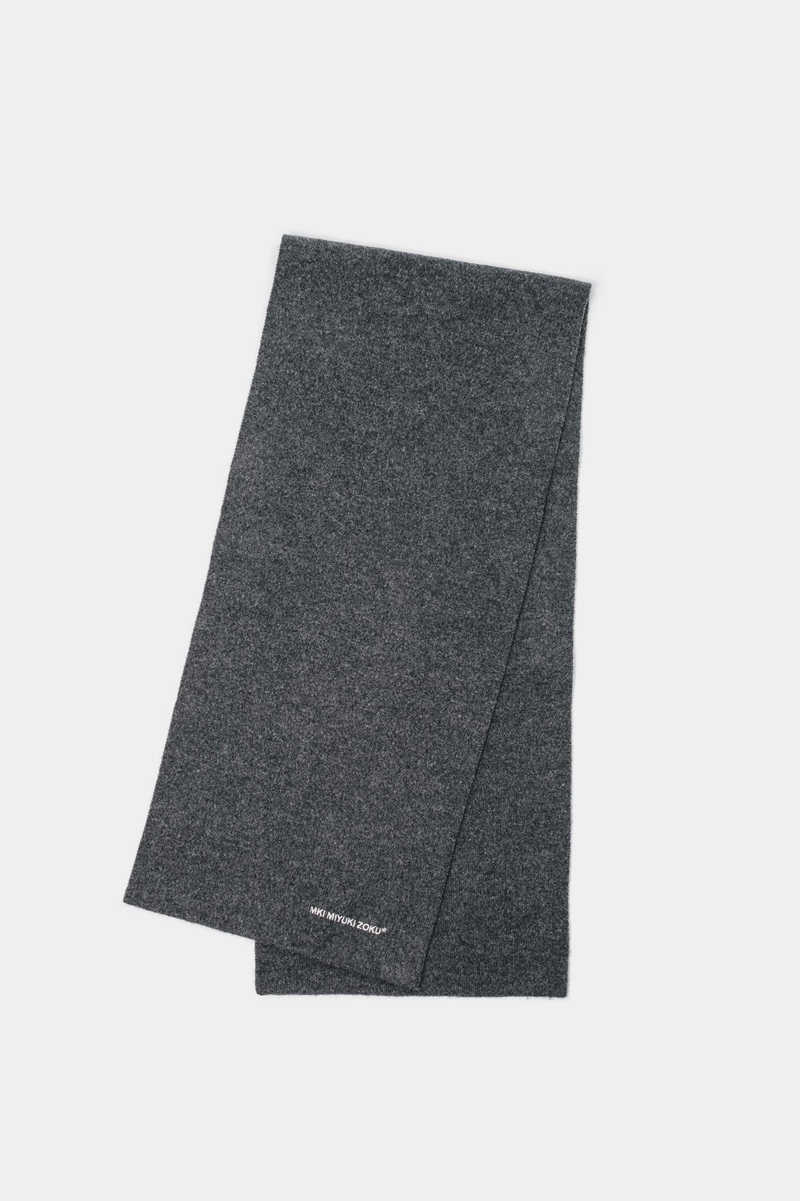 Full-length flat lay of the Charcoal double knit scarf folded lengthways