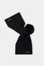 MKI MIYUKI ZOKU Double Knit Scarf in Black – knotted flat lay showing the compact double knit and embroidered logo at each end
