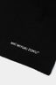 Close-up of the white MKI MIYUKI ZOKU logo embroidered on the Black double knit wool blend