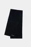 Full-length flat lay of the Black double knit scarf folded lengthways