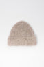 Reverse view of the Oatmeal alpaca beanie showing the soft, hairy texture and turn-up