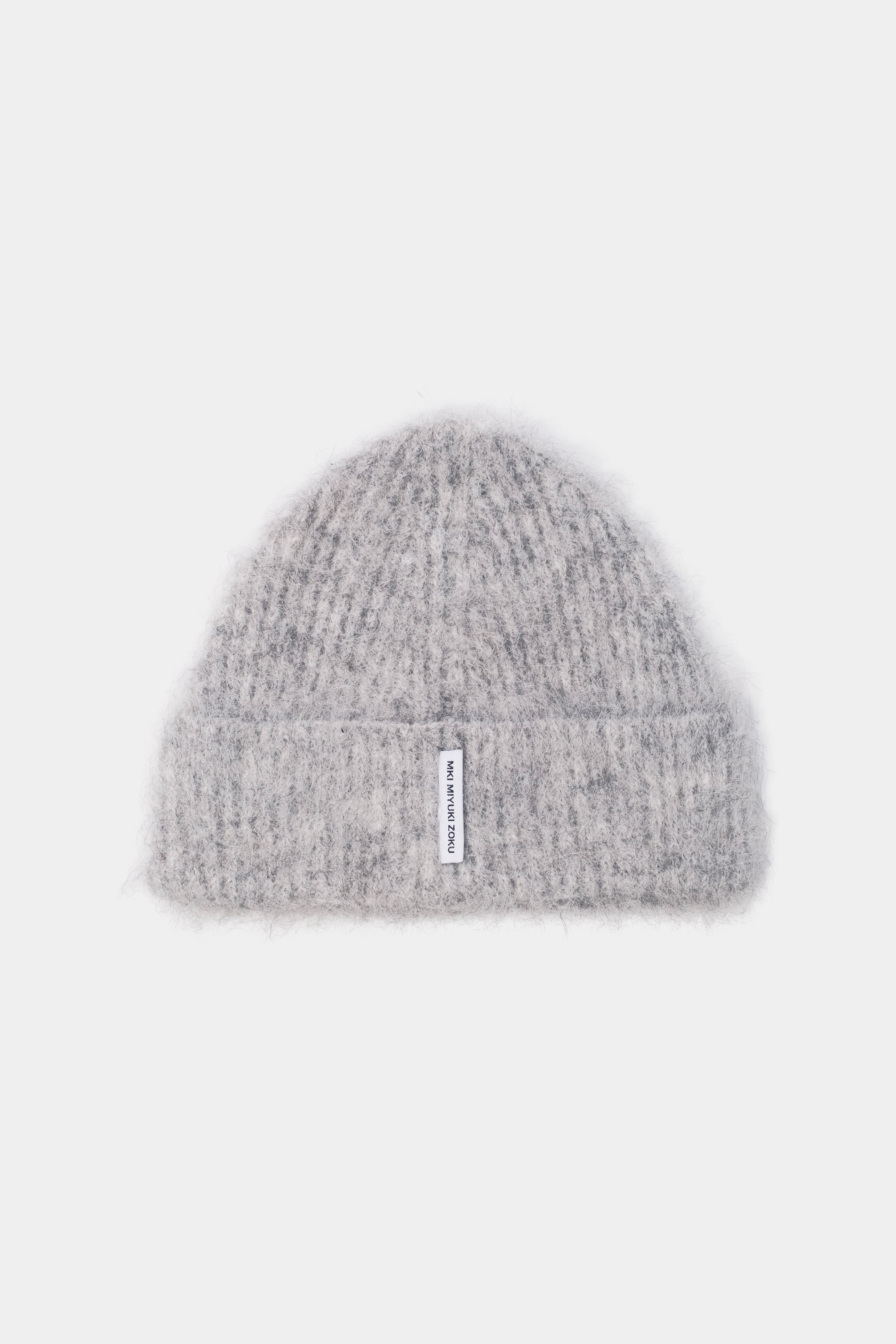 MKI MIYUKI ZOKU Alpaca Beanie in Light Grey – front view showing the fuzzy brushed alpaca knit, single turn-up and woven MKI MIYUKI ZOKU tag