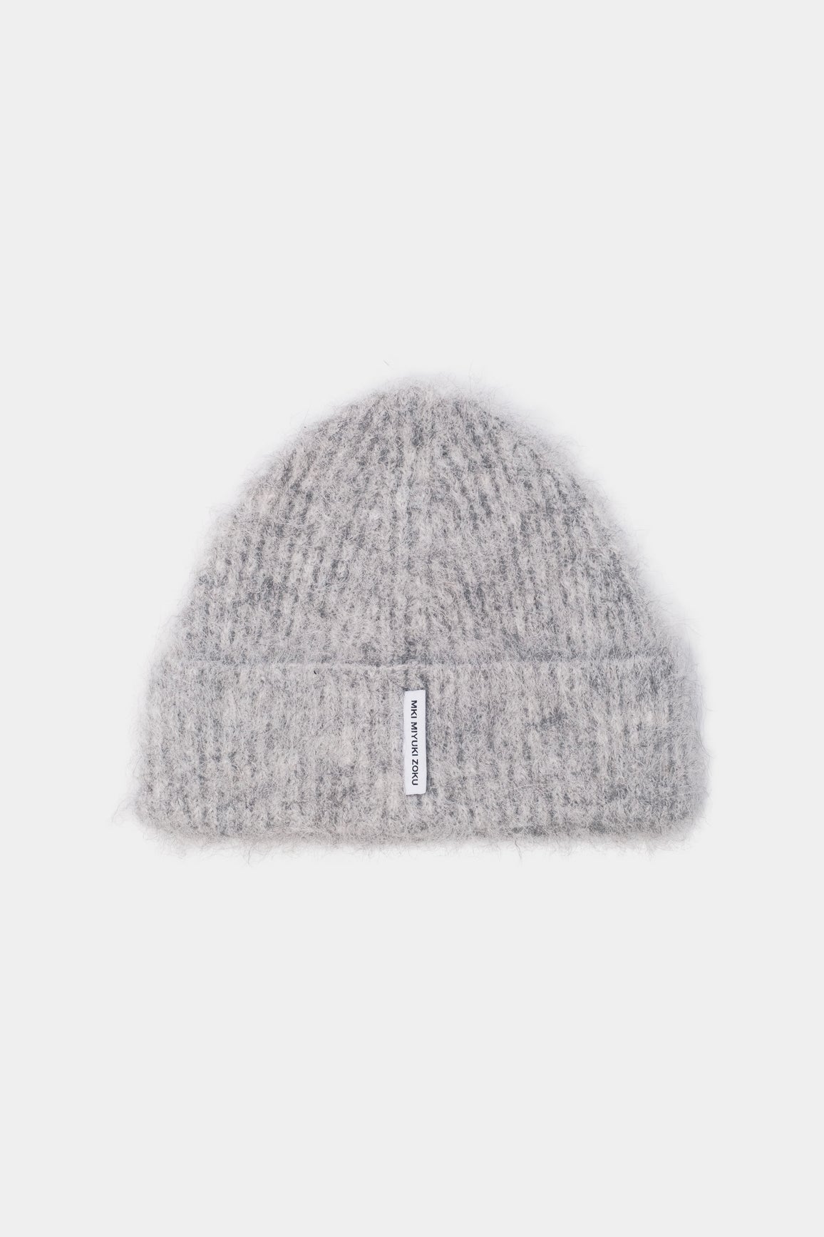MKI MIYUKI ZOKU Alpaca Beanie in Light Grey – front view showing the fuzzy brushed alpaca knit, single turn-up and woven MKI MIYUKI ZOKU tag