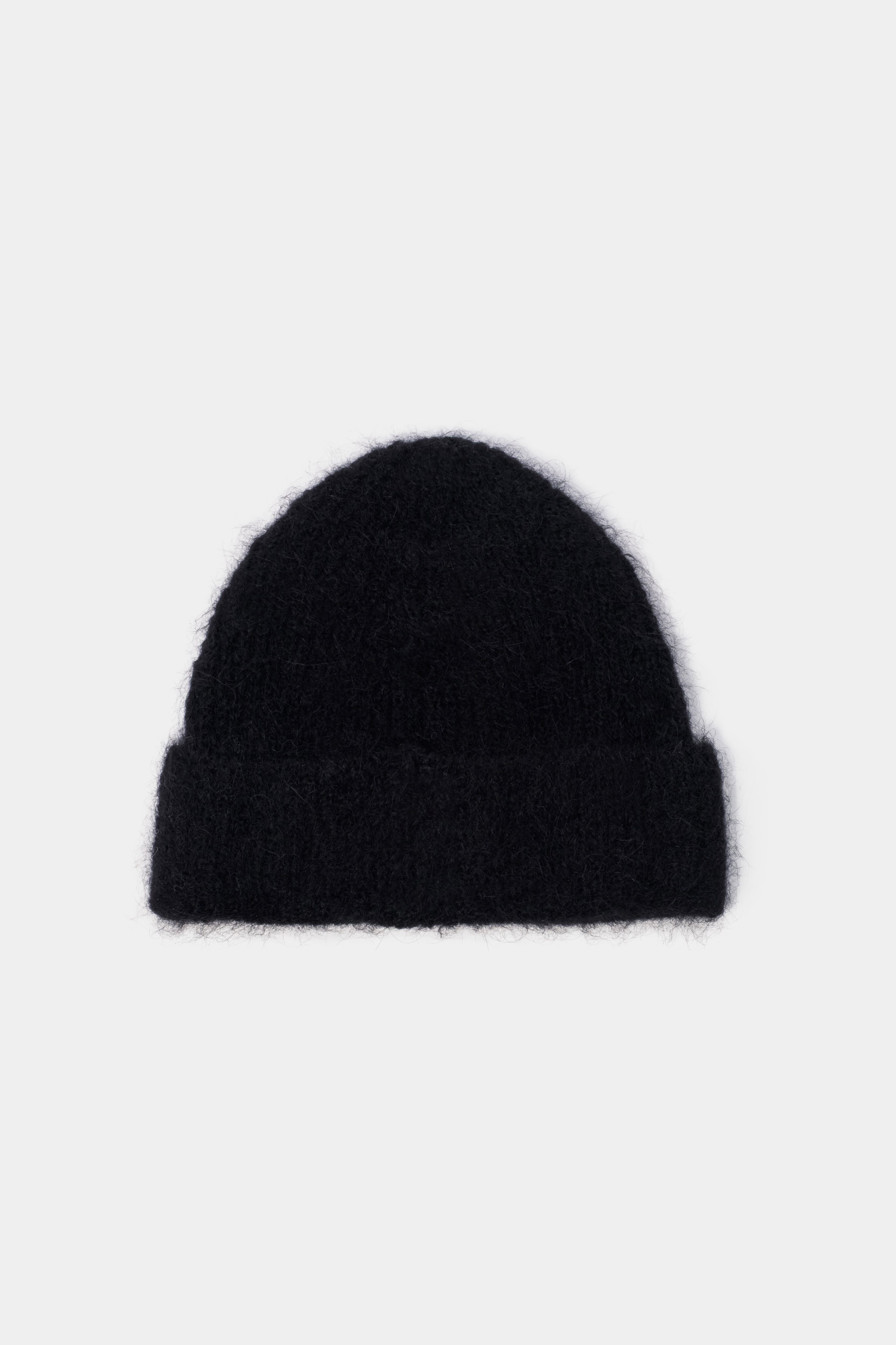 Reverse view of the Black alpaca beanie showing the soft, hairy texture and turn-up