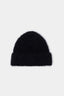 Reverse view of the Black alpaca beanie showing the soft, hairy texture and turn-up