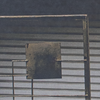 Metal square target mounted on a wire grid frame
