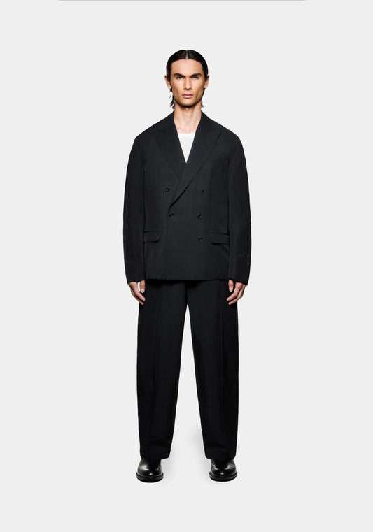Men’s black double breasted suit jacket with relaxed tailored trousers and oversized fit
