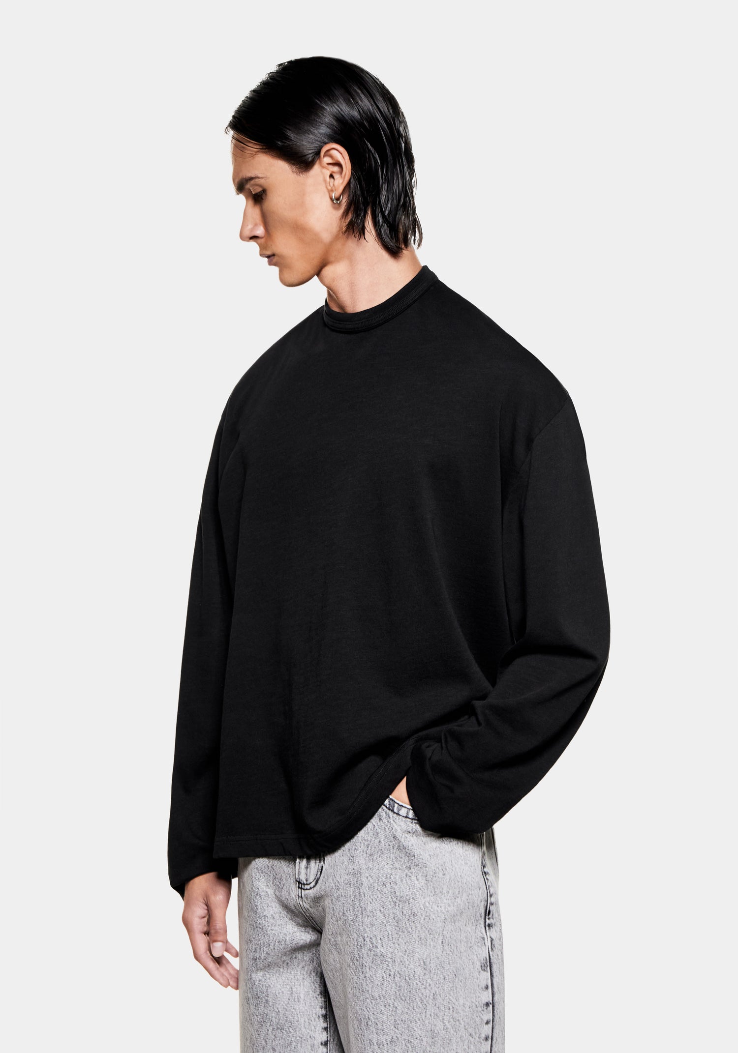 front side view of the men's boxy MKI 220gsm cotton slub jersey long sleeve t-shirt in black 