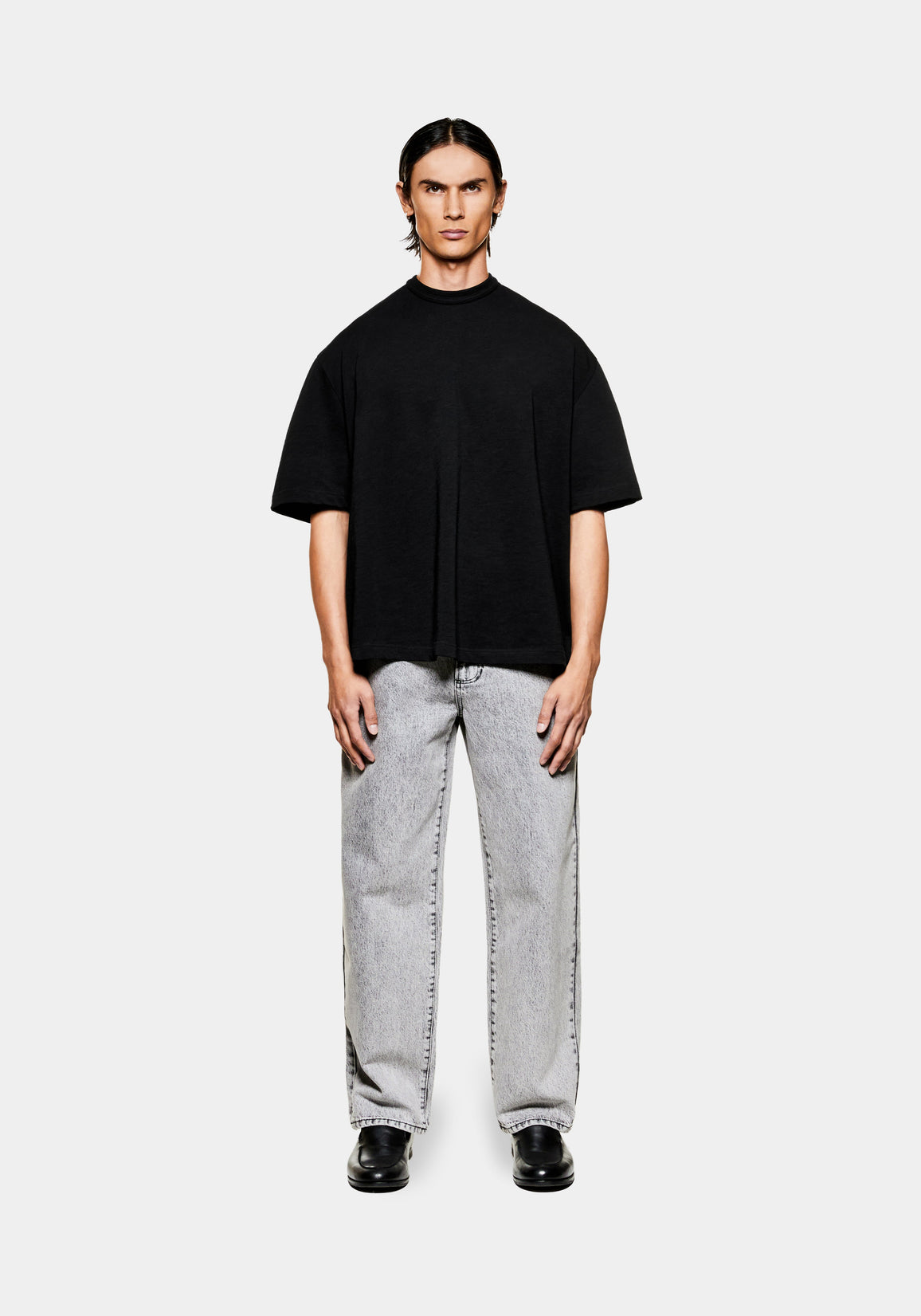 MKI MIYUKI ZOKU 220 GSM Slub T-Shirt in Black – full-length front view on the model, worn with light wash straight-leg jeans