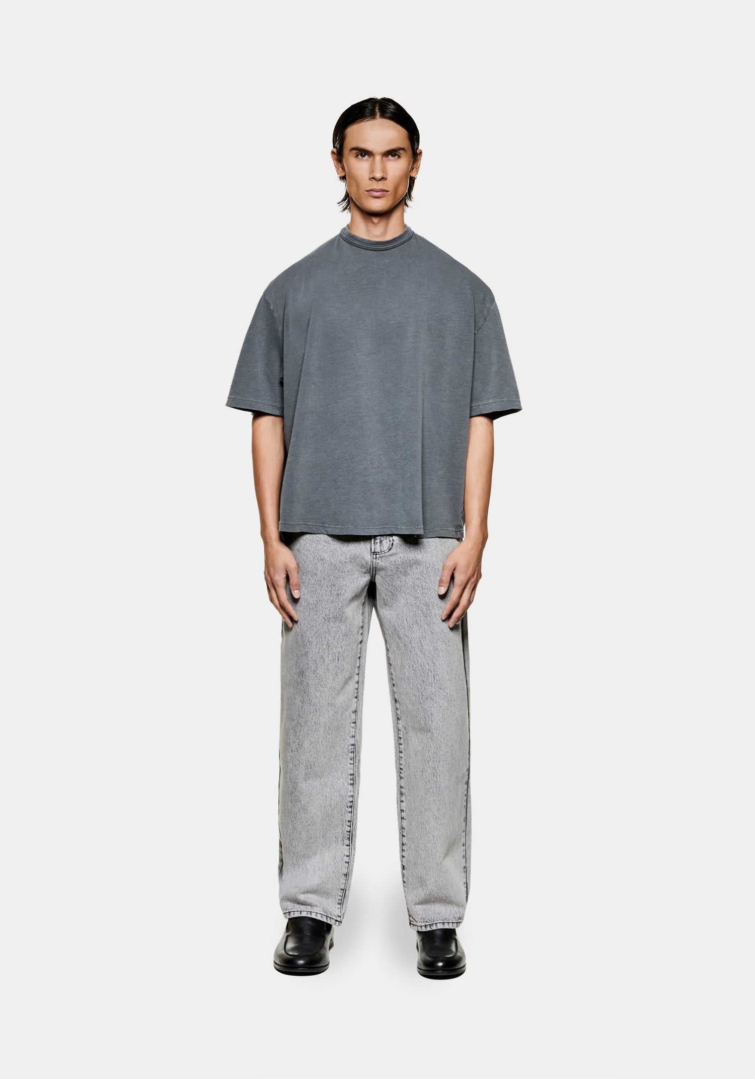 Full view of the men's MKI 220gsm cotton slub jersey t-shirt in pigment black in a subtle, boxy cropped fit