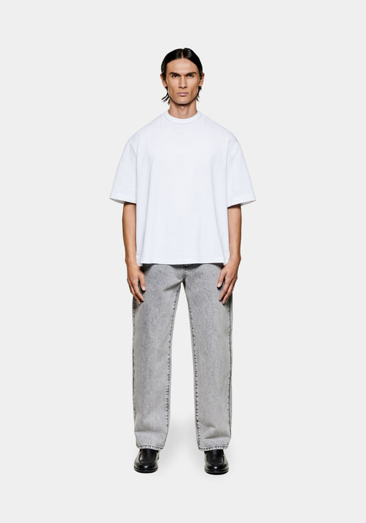 Full view of the men's MKI 220gsm cotton slub jersey t-shirt in white styled with the Miyuki Zoku Classic Denim Jeans 
