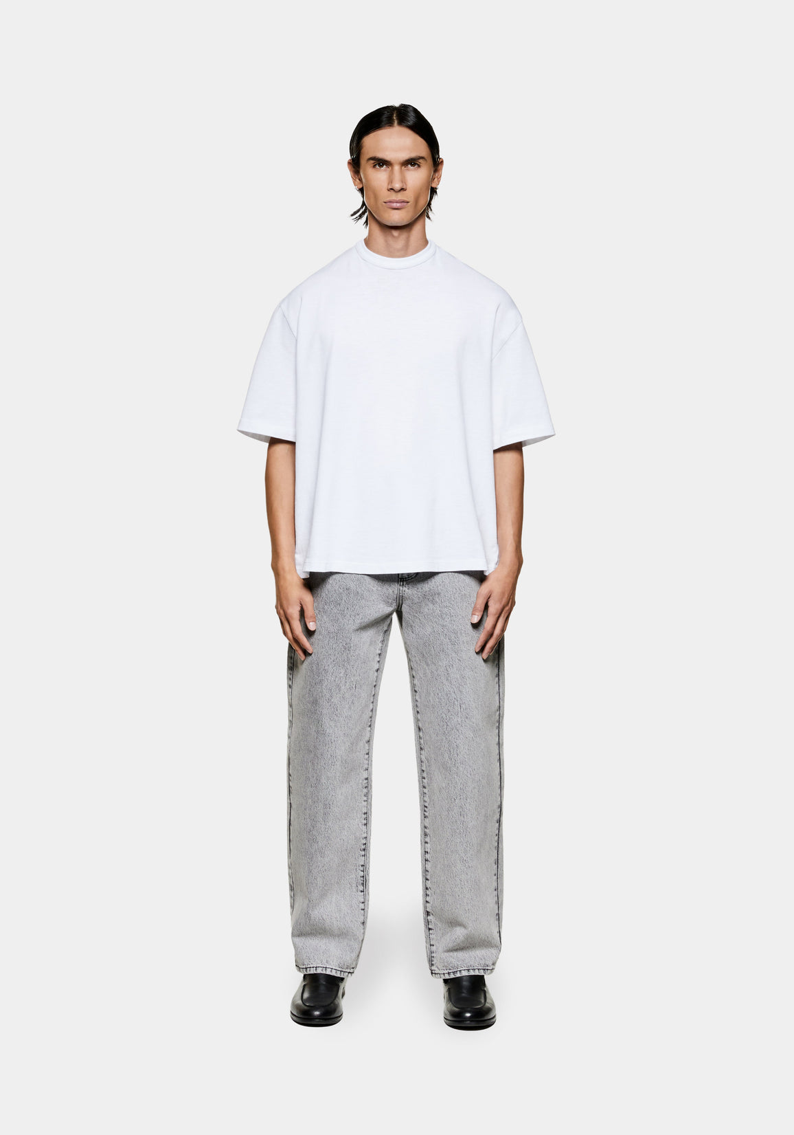 MKI MIYUKI ZOKU 220 GSM Slub T-Shirt in White – full-length front view on the model, worn with light wash straight-leg jeans