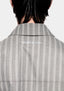 Close-up of the MKI MIYUKI ZOKU logo embroidery at the collar on the Box Dress Shirt in Grey Stripe