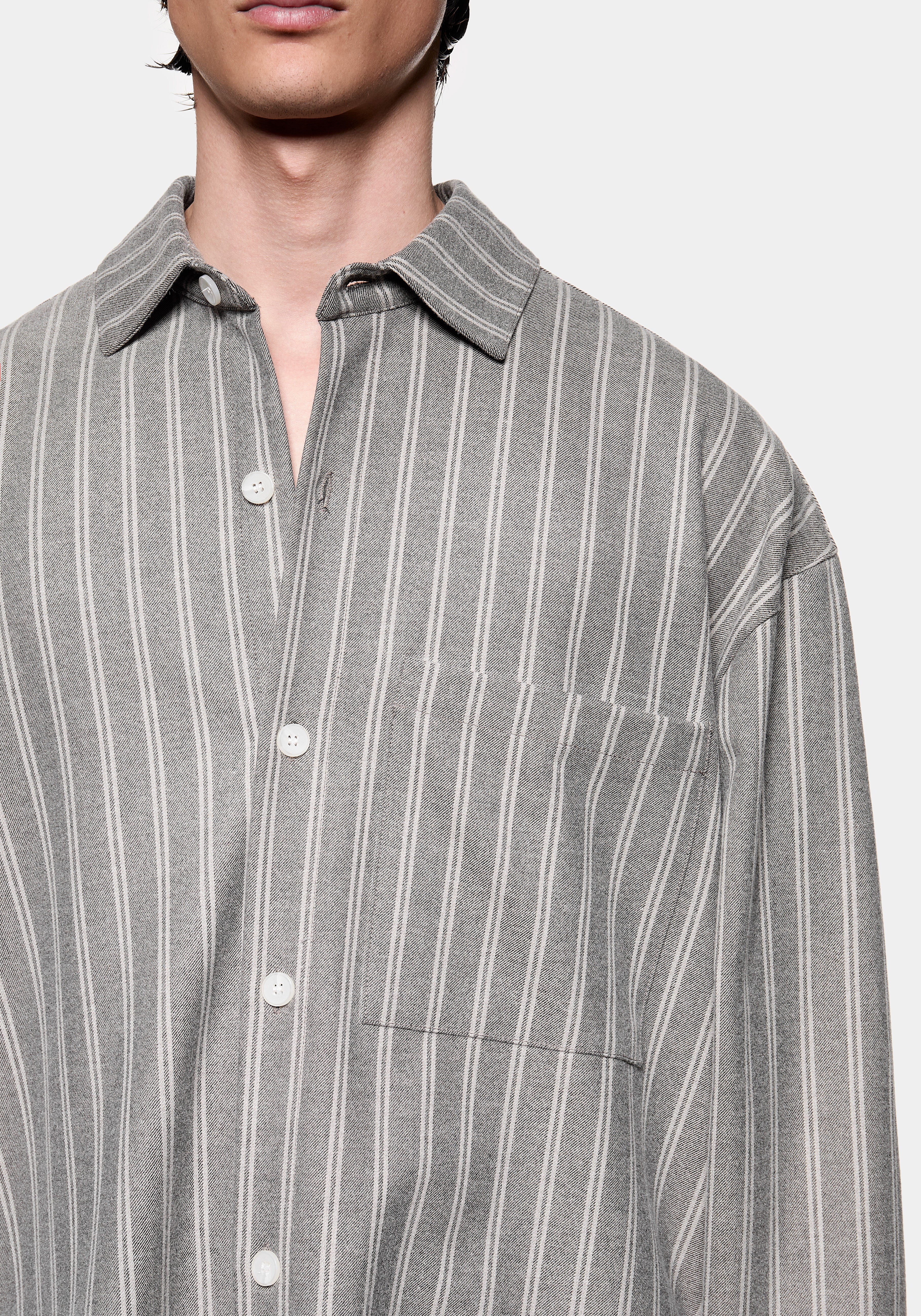 Close-up of the chest pocket on the Box Dress Shirt in Grey Stripe