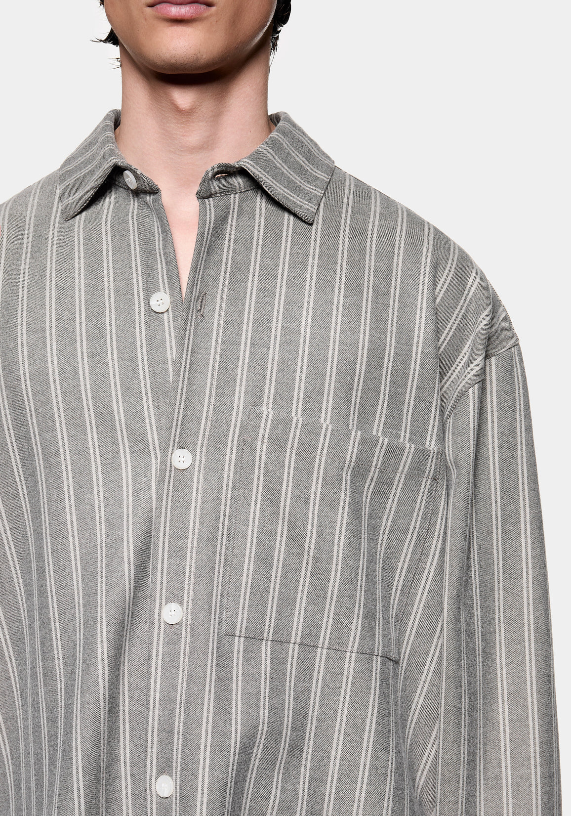 Close-up of the chest pocket on the Box Dress Shirt in Grey Stripe