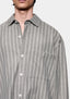 Close-up of the chest pocket on the Box Dress Shirt in Grey Stripe