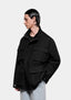 Front view showing the four 3D flap pockets and collar