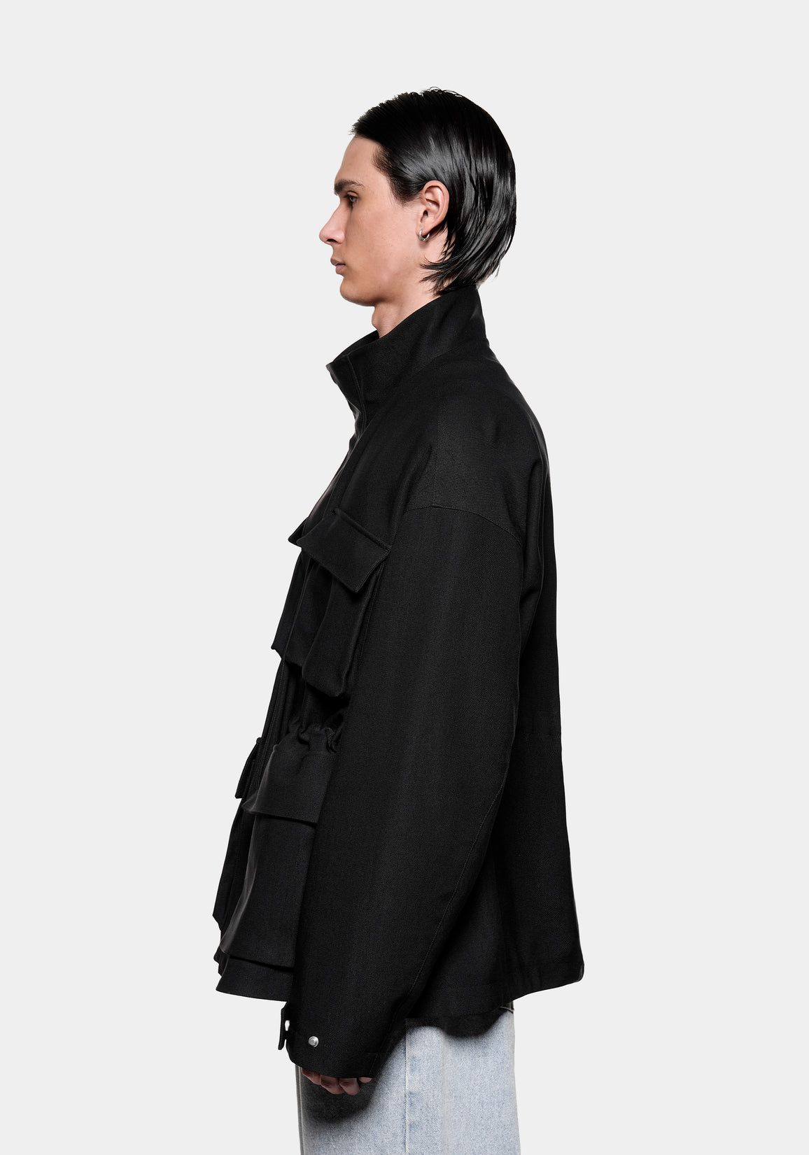 Side profile showing the pockets and dropped shoulders