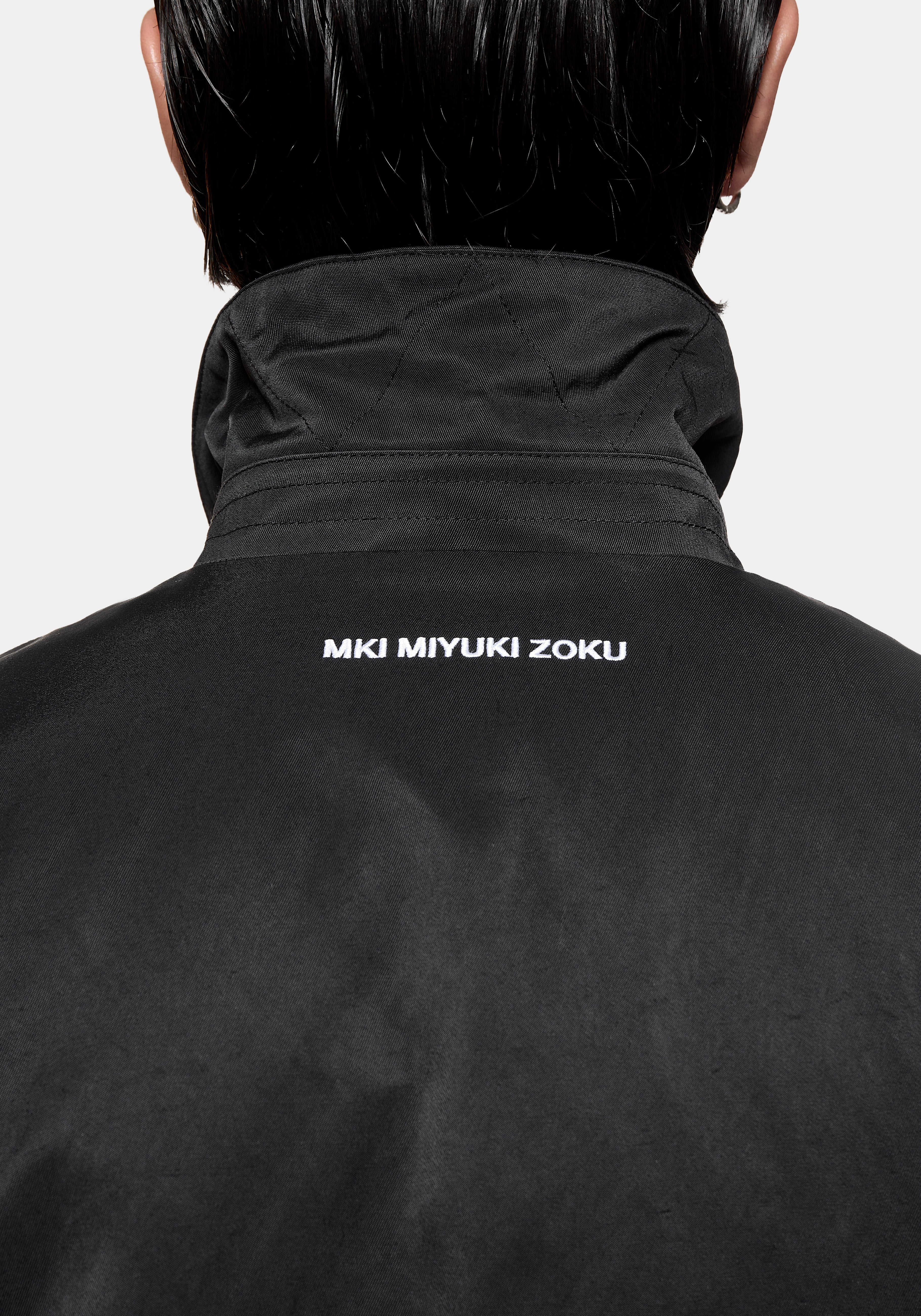 Back view showing the MKI MIYUKI ZOKU logo embroidered at the back neck