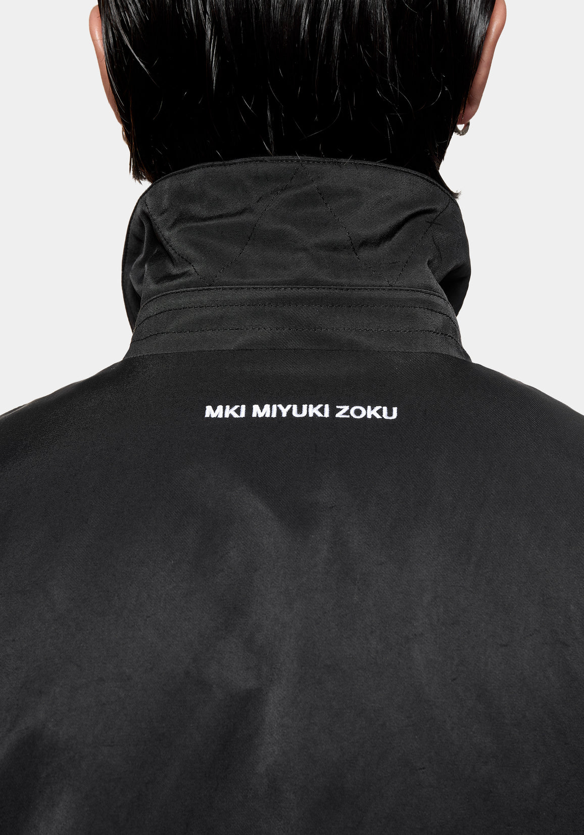 Back view showing the MKI MIYUKI ZOKU logo embroidered at the back neck