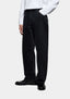 Three-quarter view of the Black Wash jeans showing the classic straight leg from hip to hem