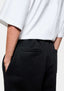 Close-up of the pointed rear patch pocket on the Black Superweight Joggers