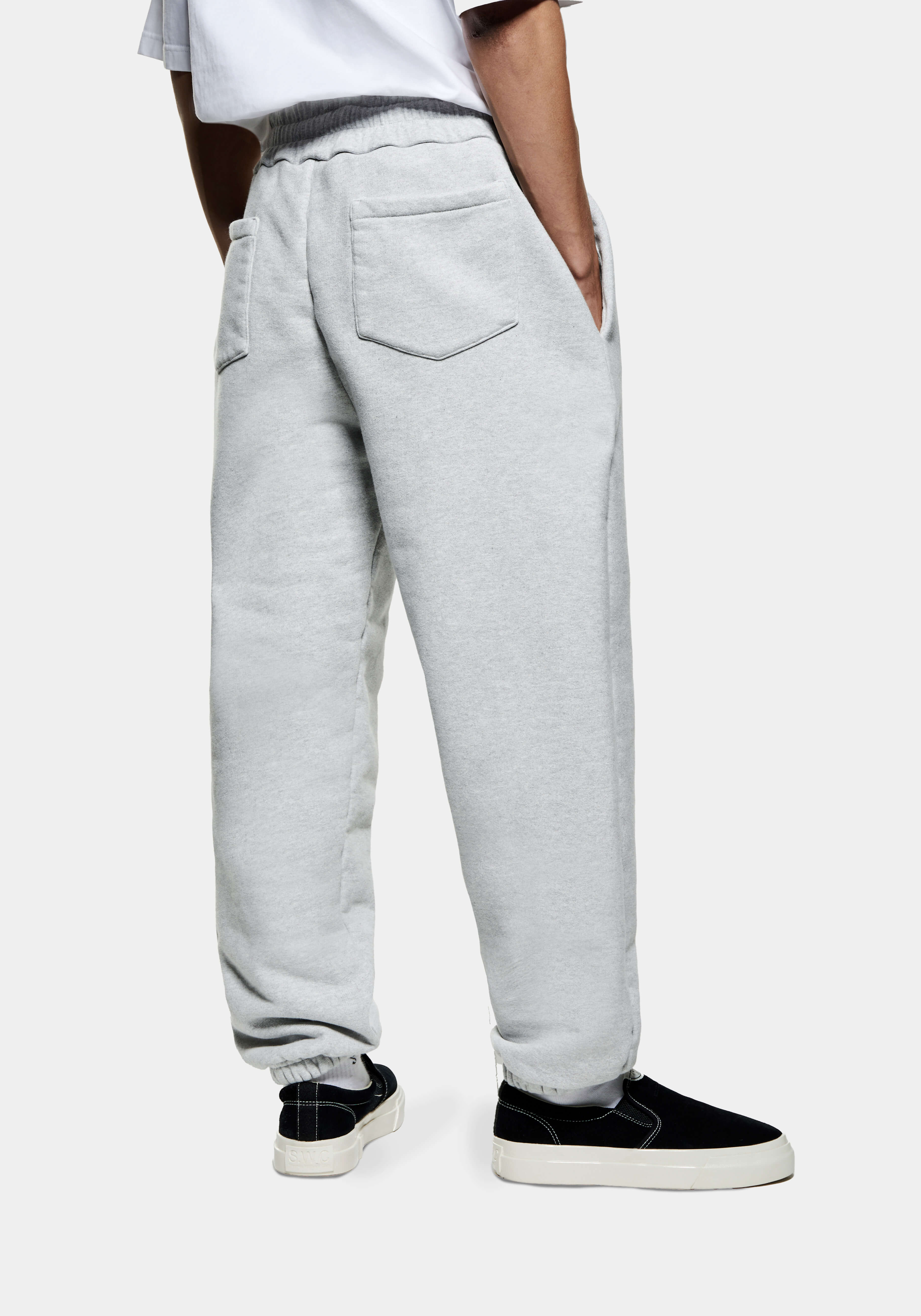Back three-quarter view of the Grey Superweight Joggers showing the rear patch pocket