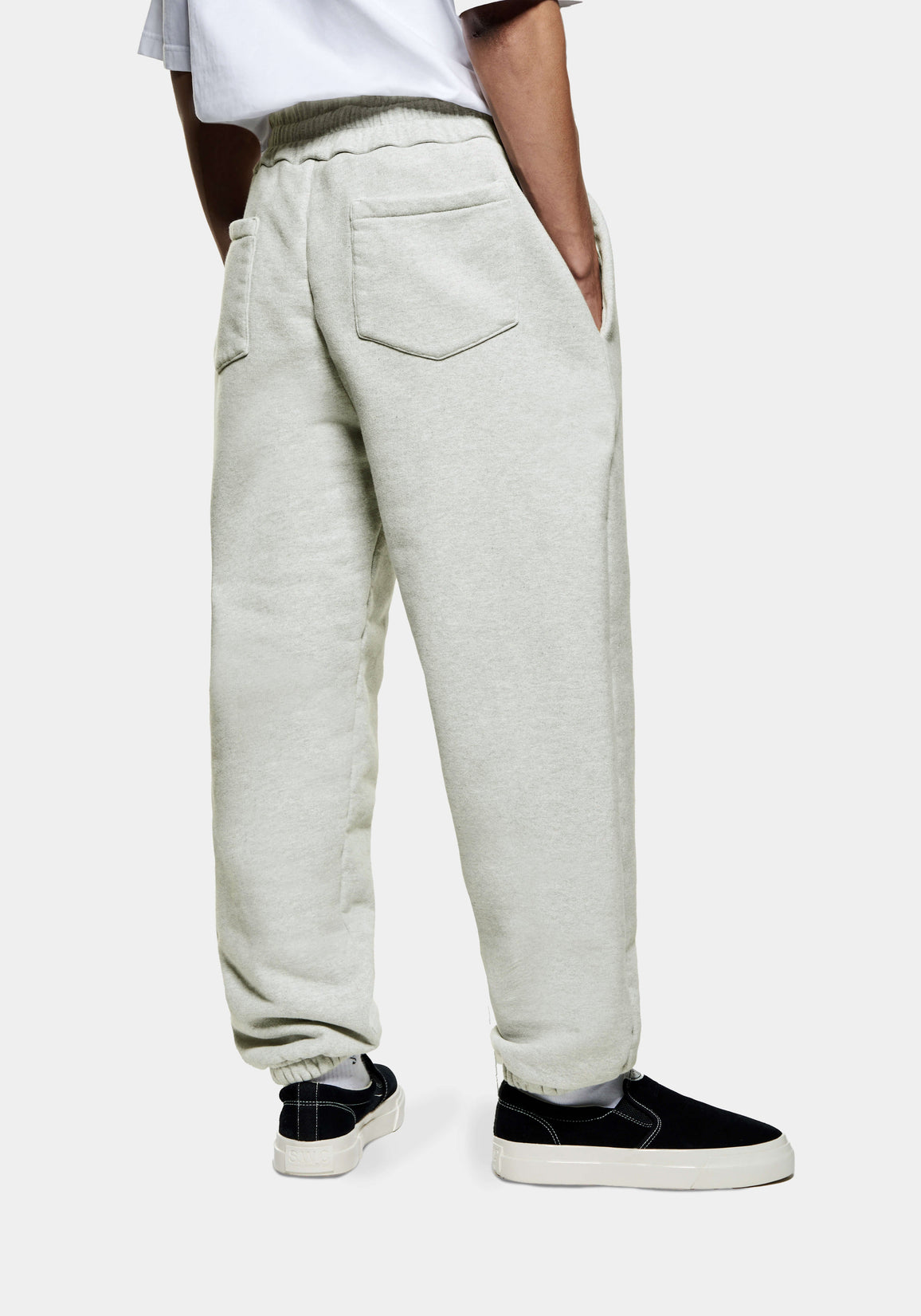 Back three-quarter view of the Oatmeal Superweight Joggers showing the rear patch pocket