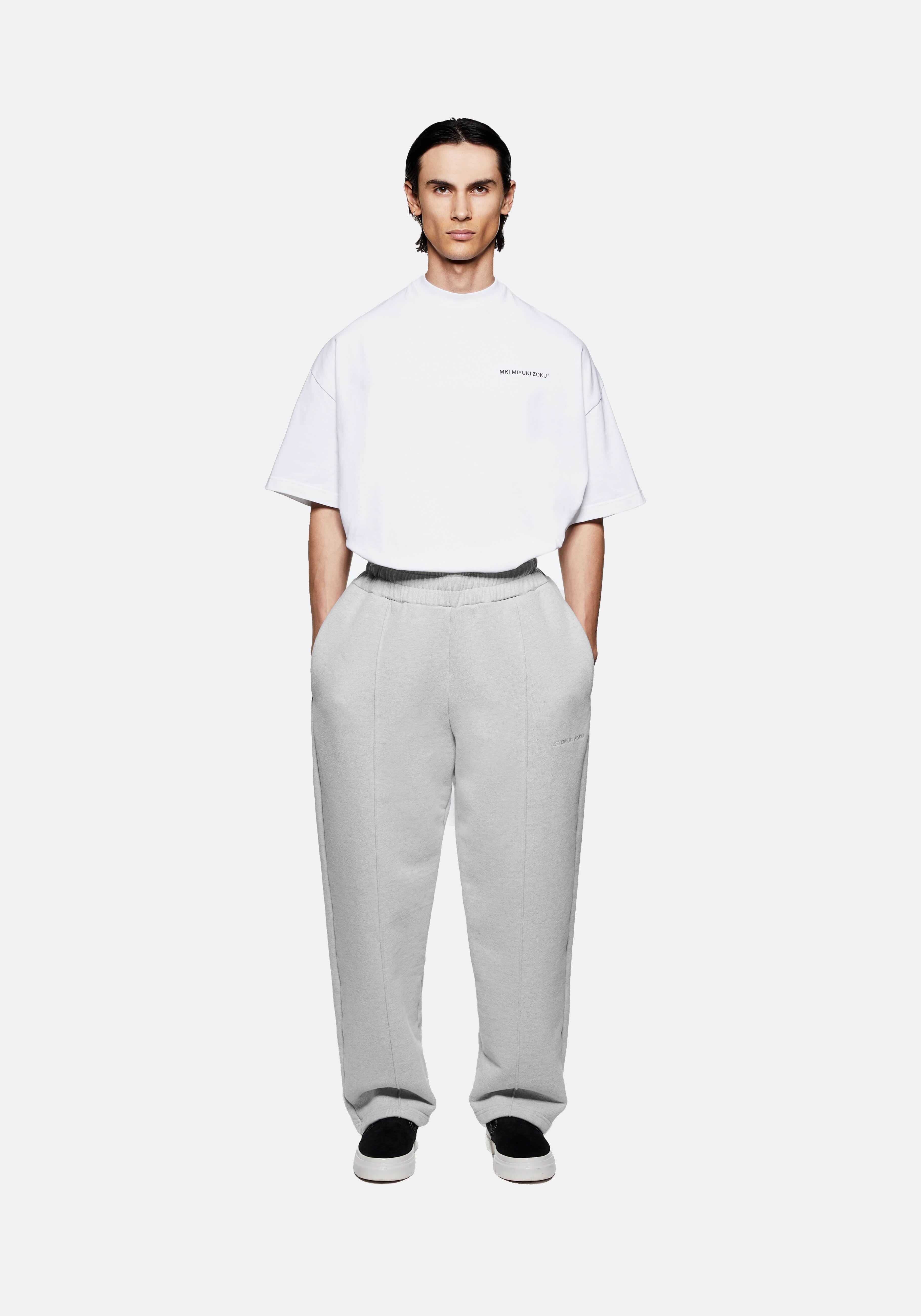 MKI MIYUKI ZOKU 800 GSM Superweight Wide Leg Joggers in Grey – full-length front view on the model showing the wide leg, front pleats and open hems