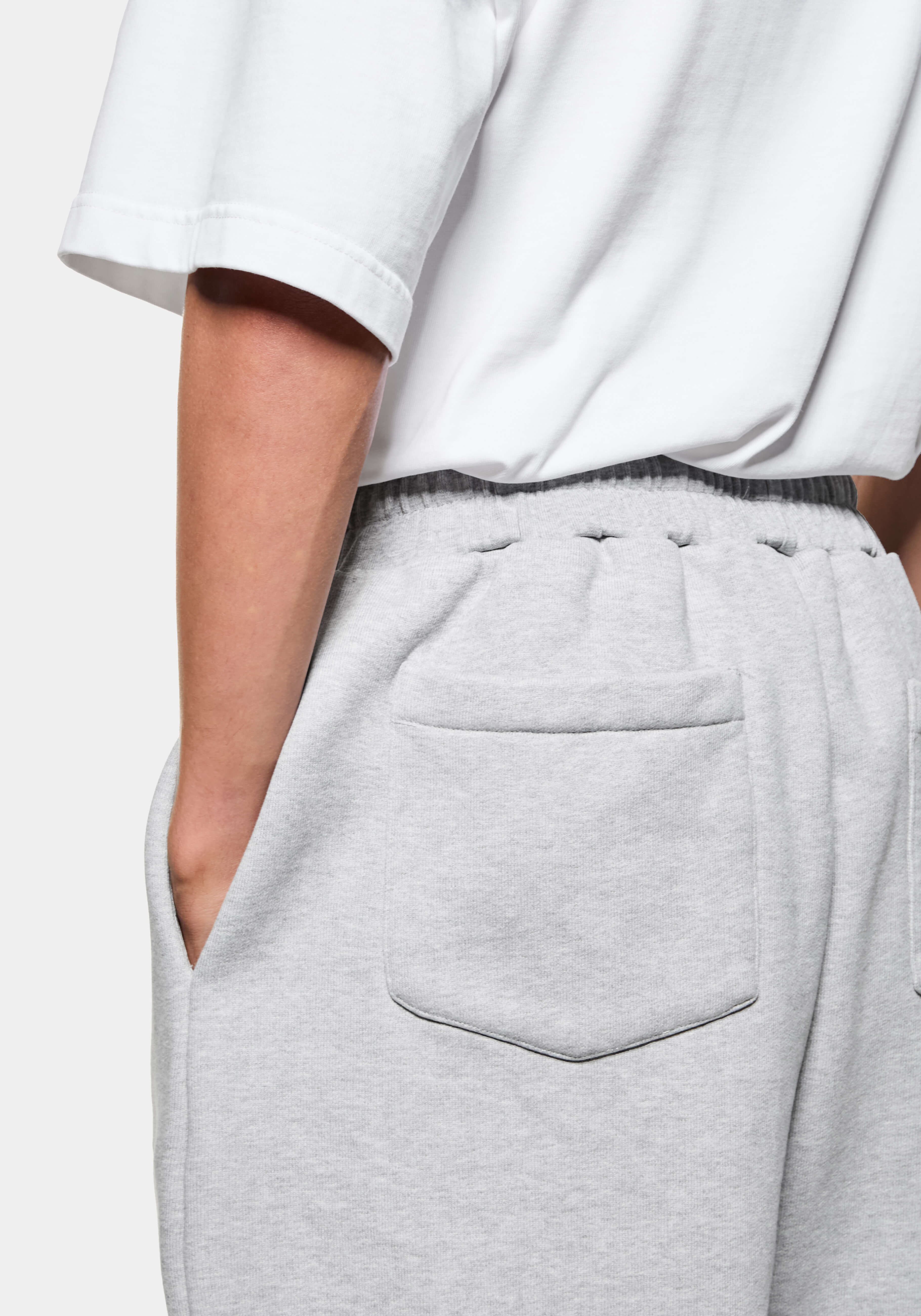 Close-up of the pointed rear patch pocket on the Grey Wide Leg Joggers