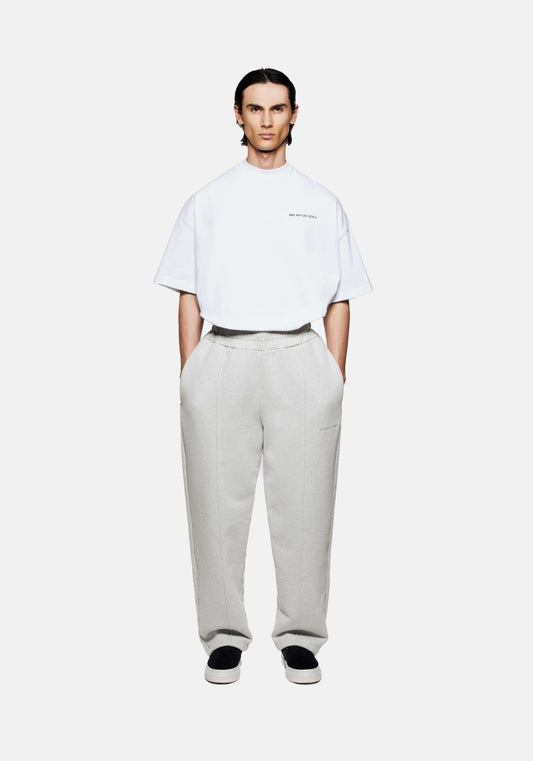 Full view of the MKI Superweight men's wide leg joggers in oatmeal cotton jersey with open hems