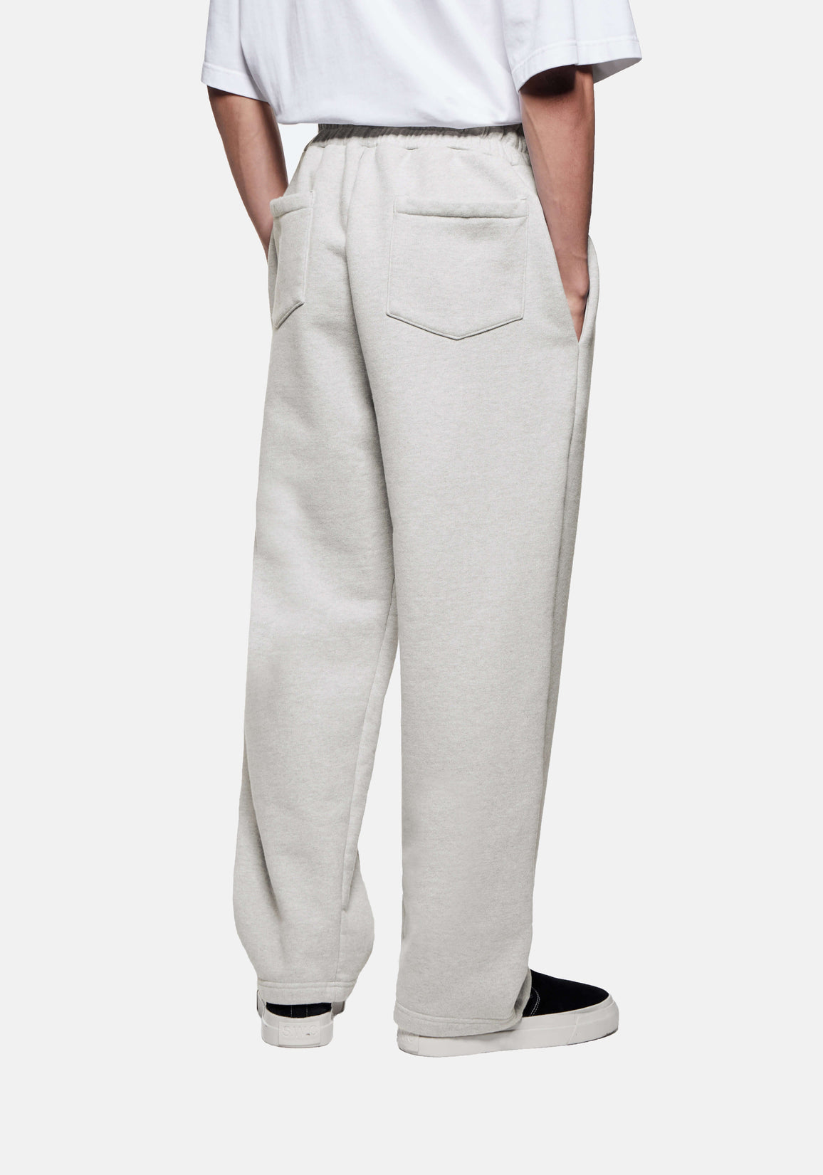 Back three-quarter view of the Oatmeal Wide Leg Joggers showing the rear patch pocket