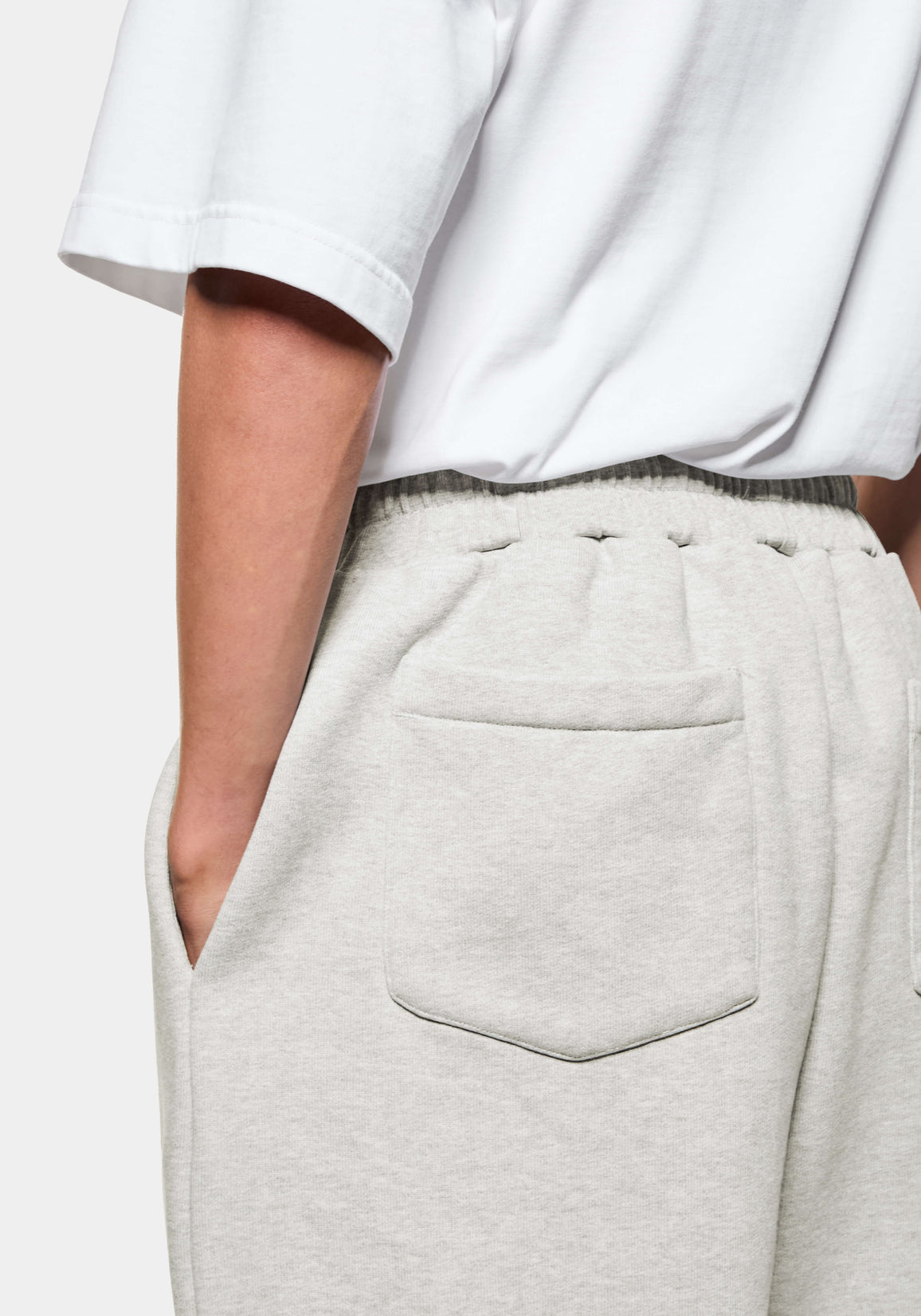 Close-up of the pointed rear patch pocket on the Oatmeal Wide Leg Joggers