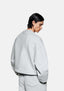 Rear side view of the Superweight Crewneck in Grey