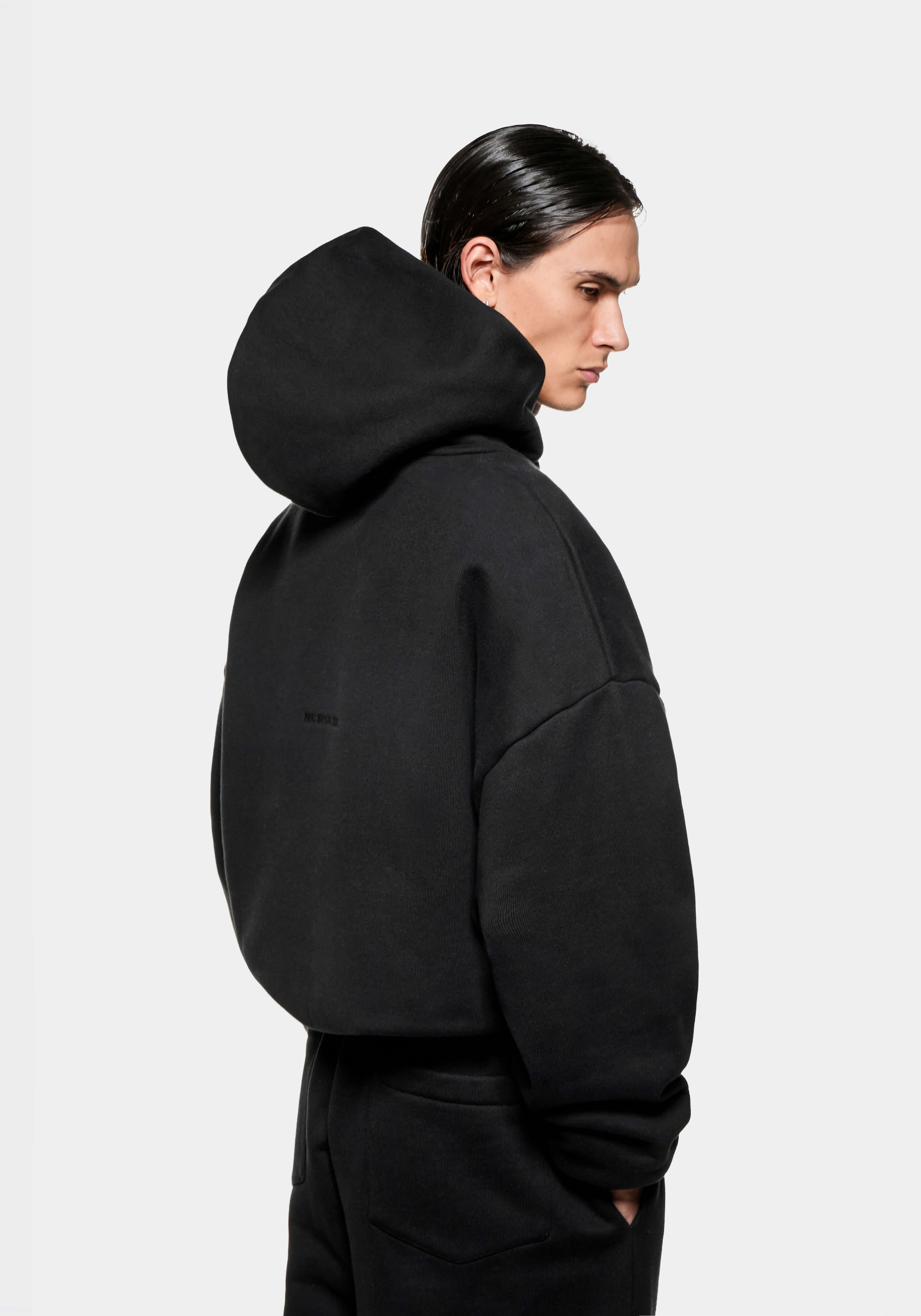 Rear side view of the Superweight Hoody in Black