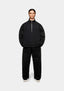 MKI MIYUKI ZOKU 800 GSM Superweight Quarter Zip in Black – full-length front view on the model showing the funnel neck, silver quarter zip and oversized fit, worn with the matching wide leg joggers