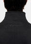 Back view of the funnel neck and tonal MKI MIYUKI ZOKU logo embroidery on the Black quarter zip
