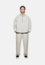 MKI MIYUKI ZOKU 800 GSM Superweight Quarter Zip in Oatmeal – full-length front view on the model showing the funnel neck, silver quarter zip and oversized fit, worn with the matching wide leg joggers