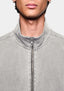 Close-up of the zip funnel neck on the track jacket