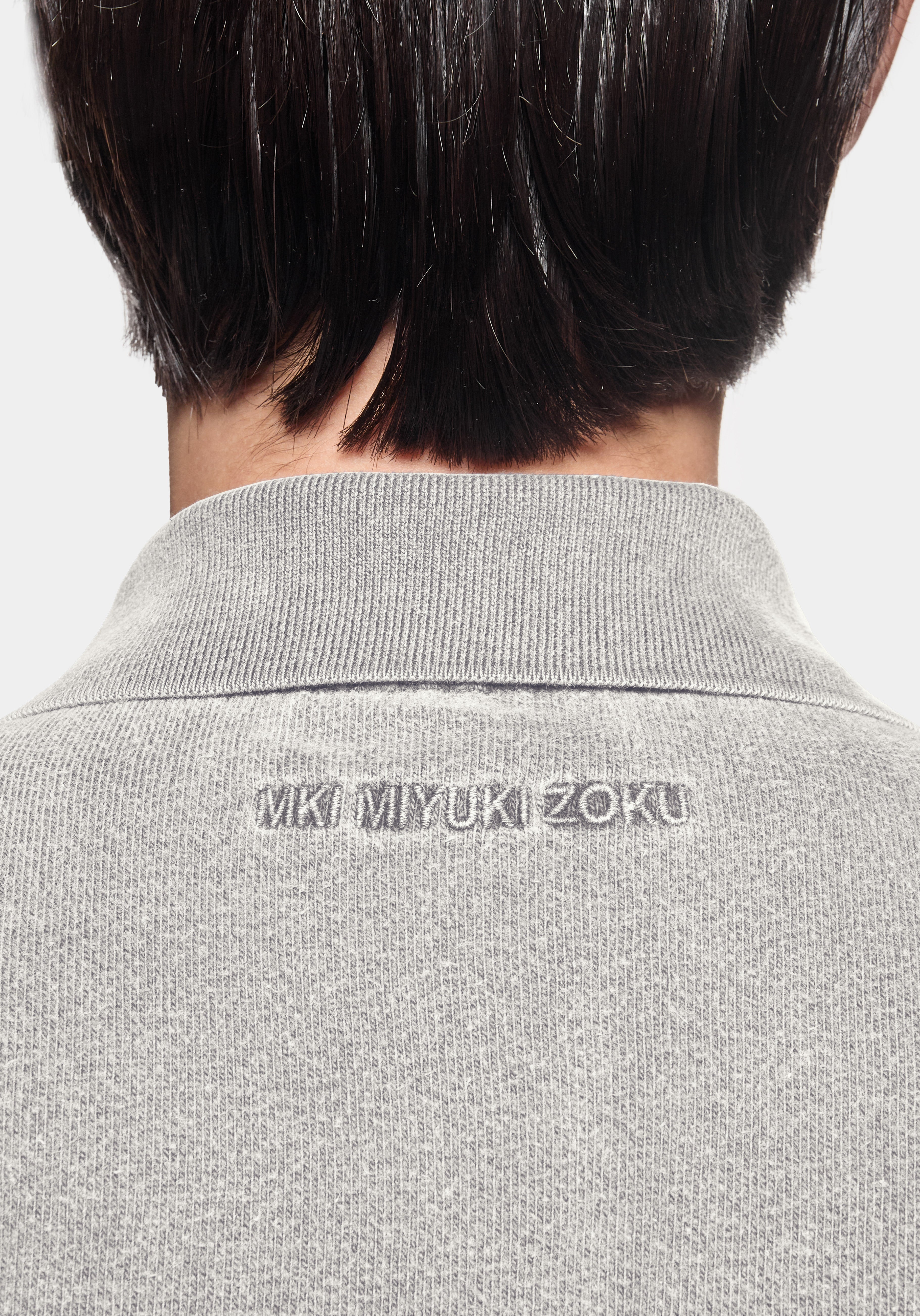 Back view showing the ribbed collar and MKI MIYUKI ZOKU embroidery