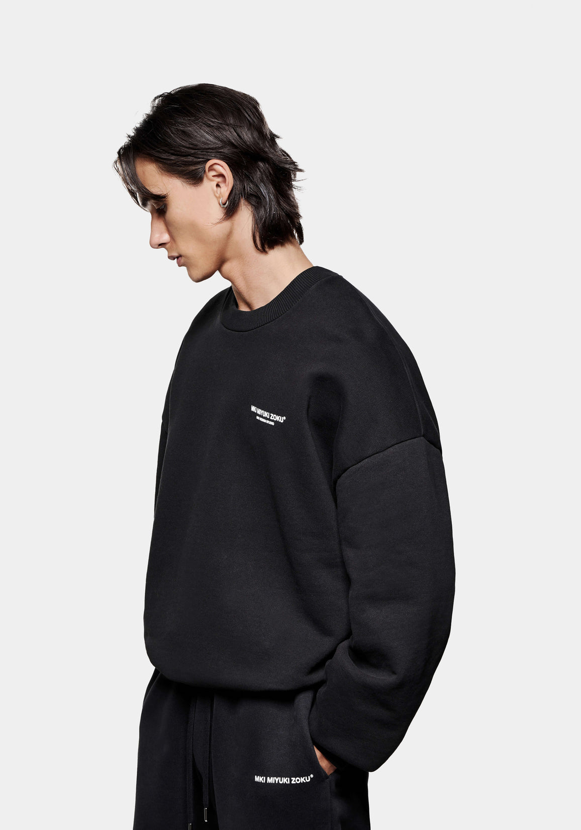 Front side view of the Design Studio Crewneck in Black