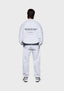 Full back view of the MKI MIYUKI ZOKU Design Studio Crewneck in Grey, in an oversized box fit