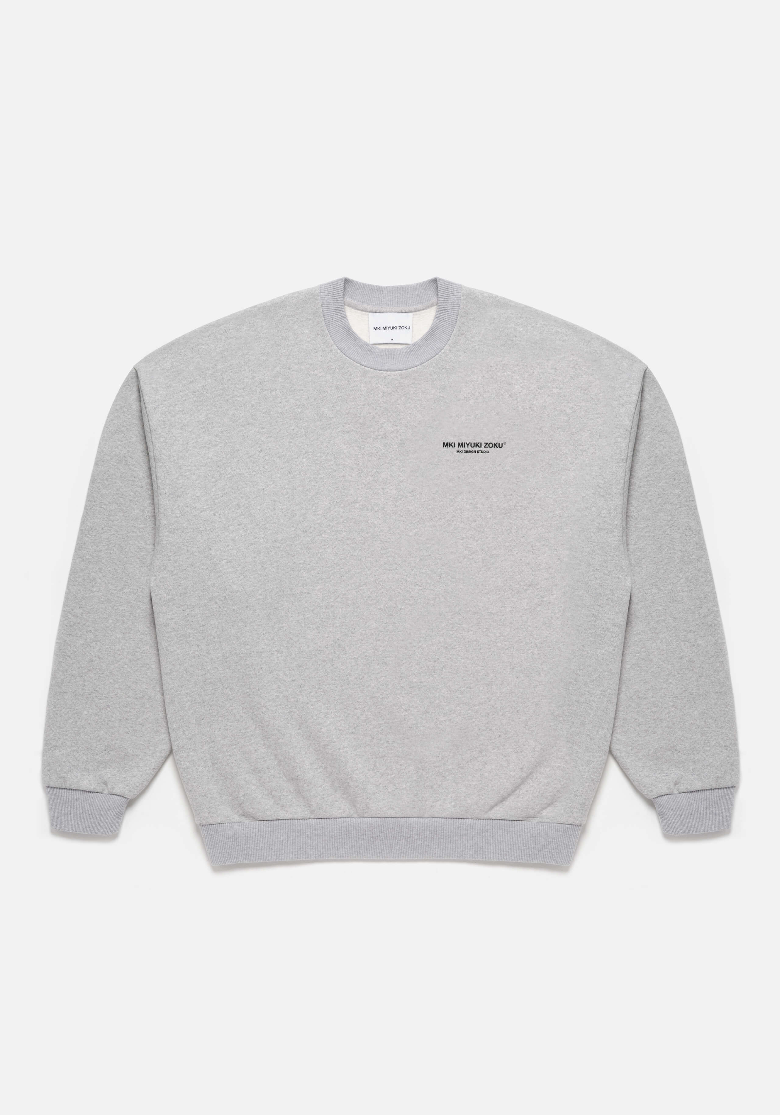 Flat lay of the Design Studio Crewneck in Grey