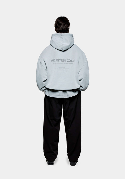 Rear view of the MKI 500gsm boxy fit heavyweight Design Studio hoodie for men in a pigment glacier colourway