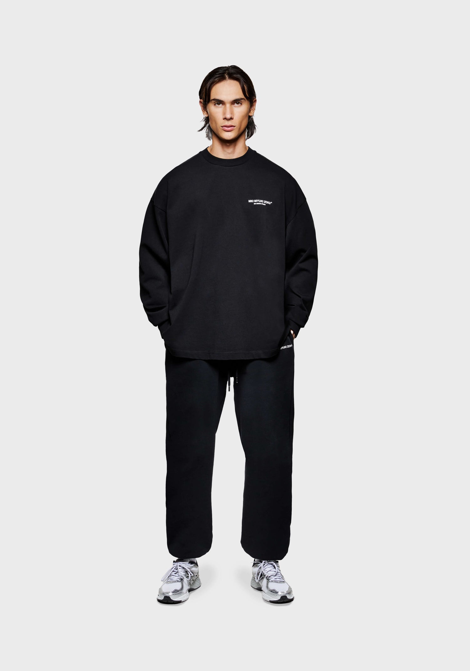 Full front view of the MKI Design Studio long sleeve oversized t-shirt in a black colourway in a boxy fit