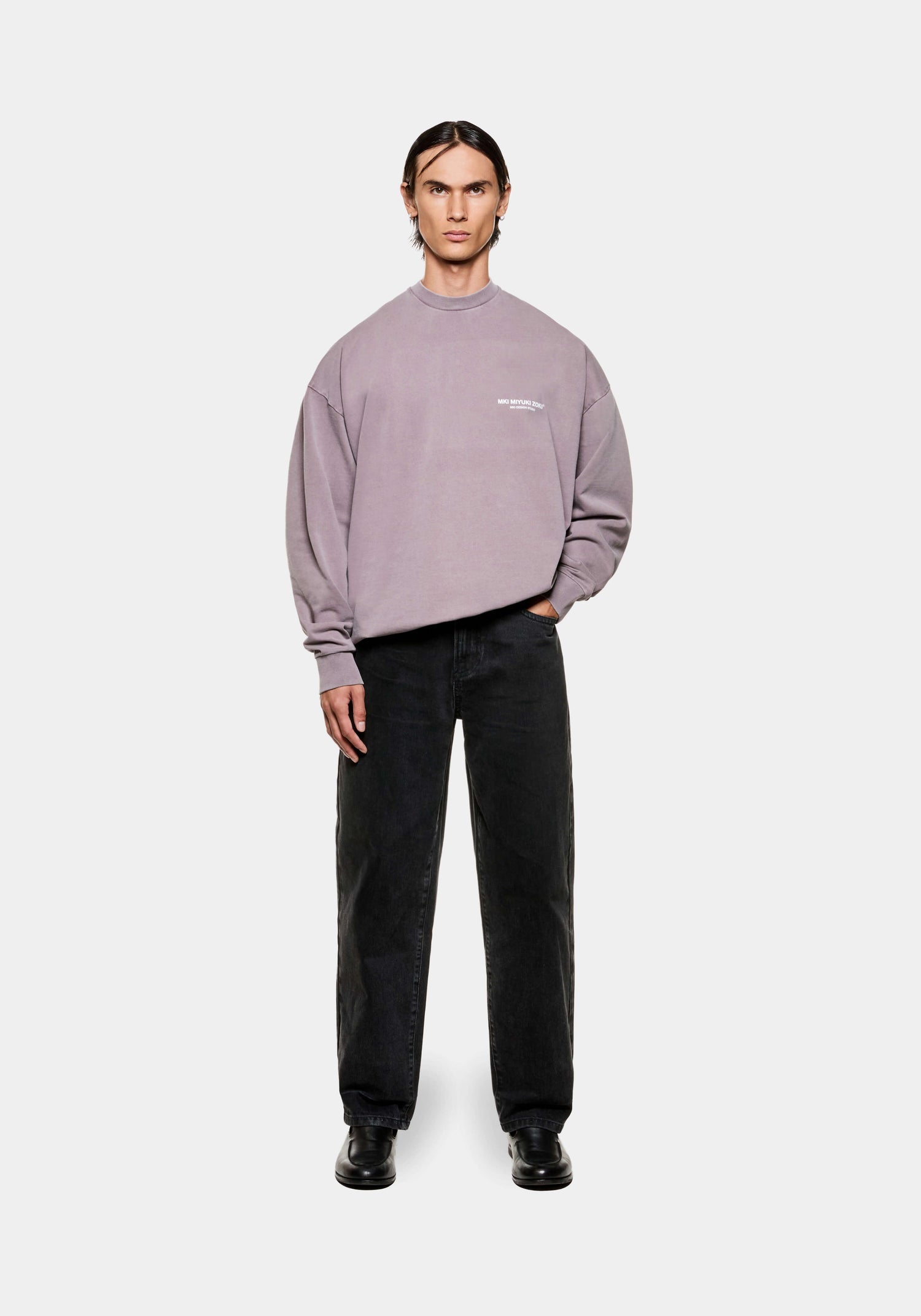 Full front view of the MKI Design Studio long sleeve oversized t-shirt in a washed pigment raisin colourway in a boxy fit