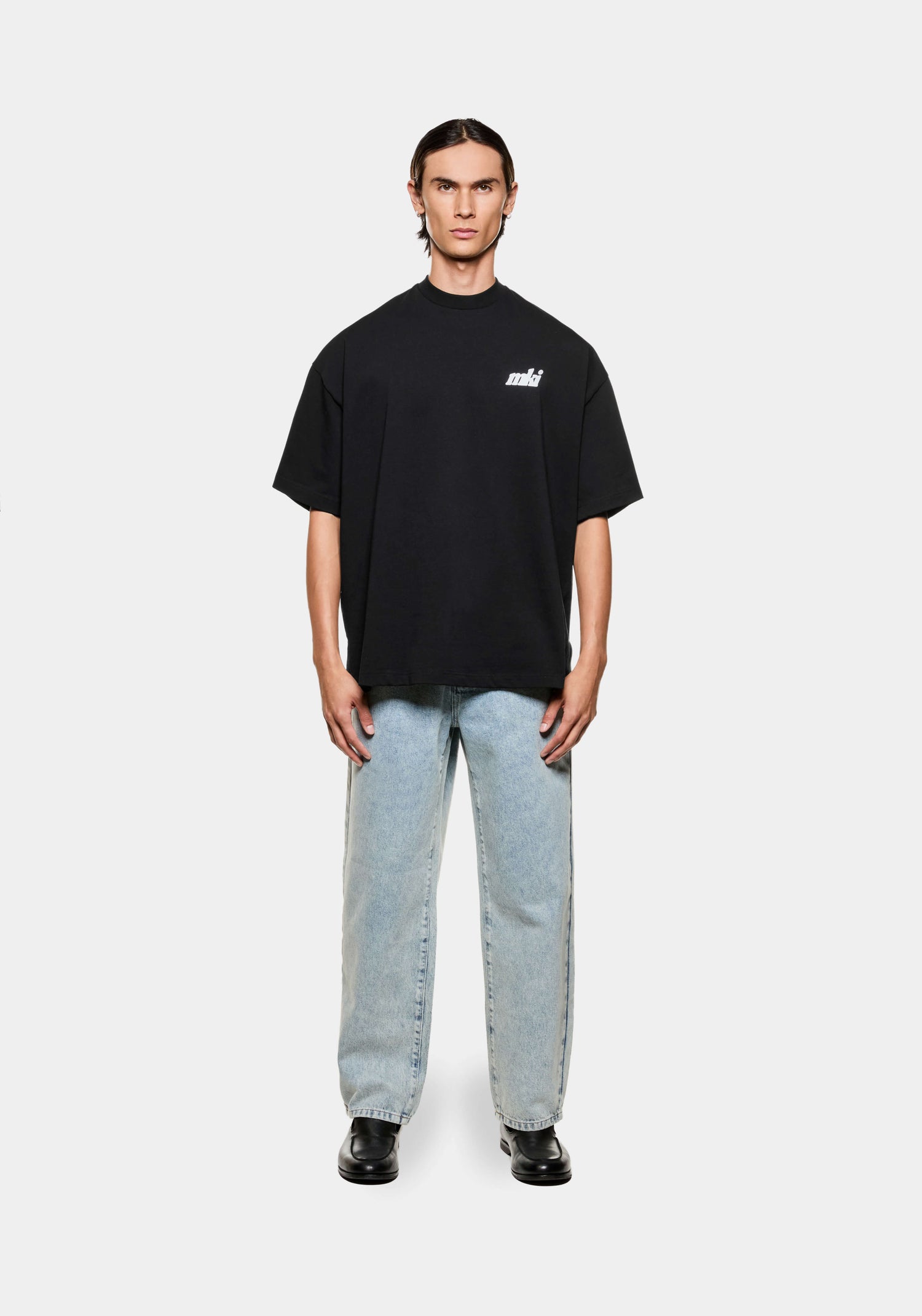 MKI men's oversized graphic t-shirt with printed Stamp branding at the chest in a boxy fit