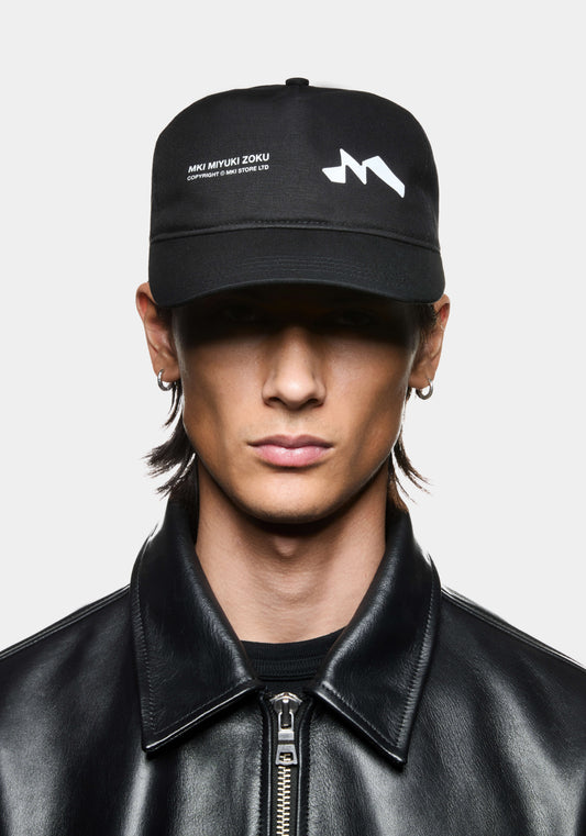 Black MKI Silhouette Cap featuring MKI Miyuki Zoku Branding.